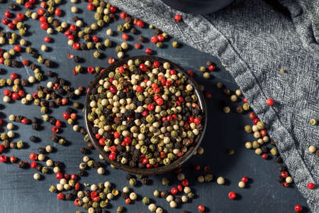 Raw Organic Dry Peppercorns in a Bowlの写真素材
