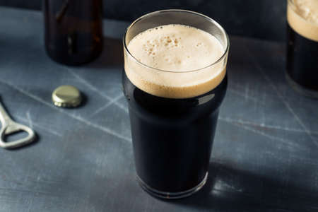 Refreshing Cold Irish Stout Beer in a Pint Glass