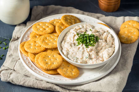 Homemade Smoked Salmon Dip with Chives and Crackersの写真素材