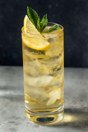 Boozy Refreshing Green Tea Highball Cocktail with Whiskey and Lemonの写真素材