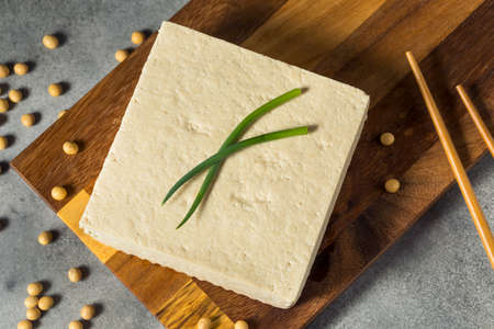 Raw White Organic Extra Firm Tofu Made with Soy Beansの写真素材