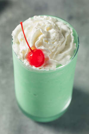 Homemade St Patricks Mint Milkshake with Whipped Creamの写真素材