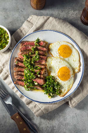 Homemade American Steak and Eggs Breakfast with Parsley and Saltの写真素材