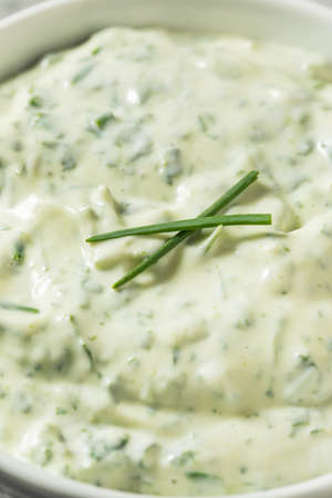 Homemade Savory Herby Mayonnaise with Basil and Chivesの写真素材