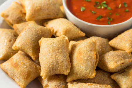 Homemade Microwaved Frozen Pizza Rolls with Marinara Sauceの写真素材