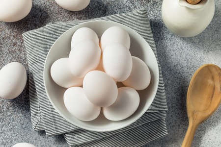 Raw Organic Cage Free White Eggs in a Group