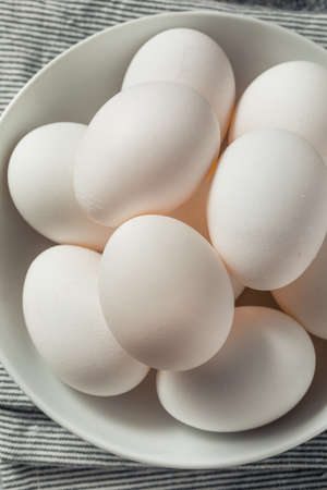 Raw Organic Cage Free White Eggs in a Group