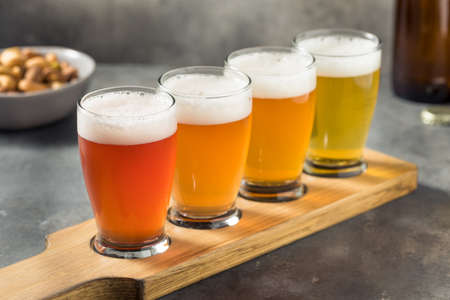 Cold Refreshing Sour Beer Flight with Cocktail Nutsの写真素材