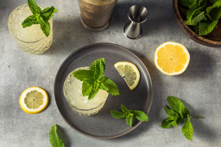 Cold Boozy Refreshing Whiskey Smash Cocktail with Mintの写真素材