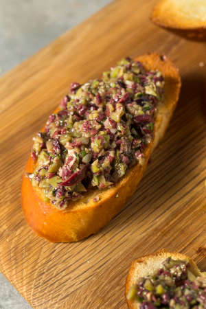 Homemade Mixed Olive Tapenade Appetizer with Toasted Bread