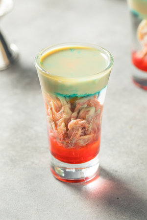 Boozy Alien Brain Hemorrhage Shot Cocktail for Halloweenの写真素材