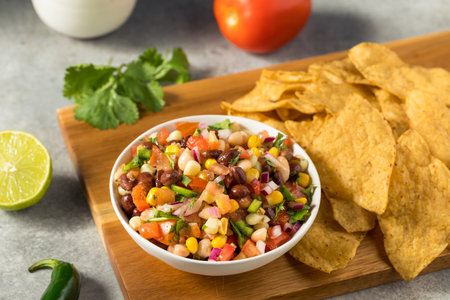Homemade Organic Cowboy Caviar Dip with Corn Beans and Chips