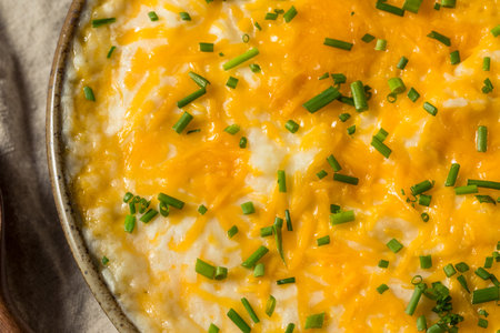 Homemade Cheesy Mashed Potatoes with Sour Cream and Chivesの写真素材