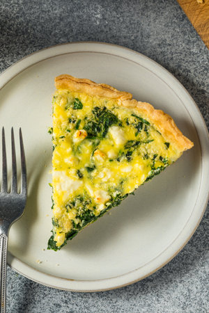 Homemade Feta Spinach Quiche Tart with Eggs and Onion