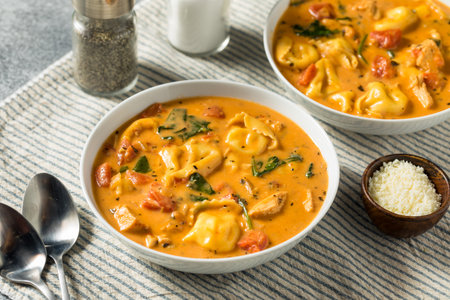 Homemade Creamy Tortellini The Soup with Chicken and Tomatoの写真素材