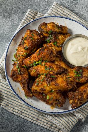 Homemade Nashville Hot Chicken Wings with Ranch Dressingの写真素材