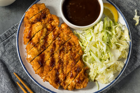 Homemade Japanese Chicken Katsu with Cabbage and Tonkatsu Sauceの写真素材