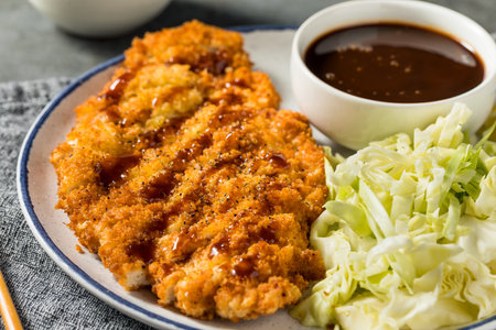Homemade Japanese Chicken Katsu with Cabbage and Tonkatsu Sauceの写真素材