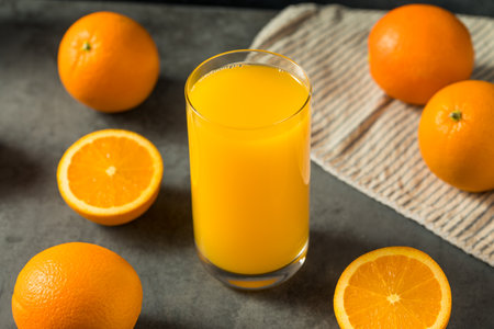 Organic Fresh Squeeze Orange Juice in a Glassの写真素材
