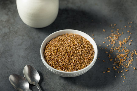 Raw Brown Organic Bulgar Wheat in a Bowlの写真素材