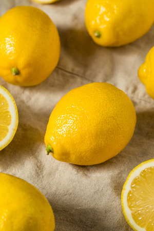 Organic Raw Seedless Yellow Lemons in a Bunchの写真素材