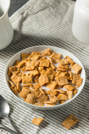 Sweet Crunchy Cinnamon Breakfast Cereal with Milkの写真素材