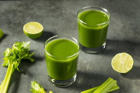 Healthy Green Organic Celery Juice with LIme in a Glassの写真素材