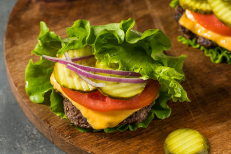 Gluten Free Paleo Bunless Cheeseburger with Lettuce and Tomatoの写真素材