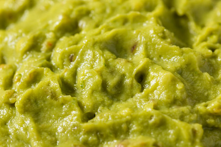 Organic Homemade Avocado Guacamole Dip with Tomatoの写真素材