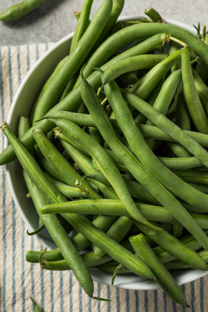 Organic Raw French Green Beans in a Bowlの写真素材