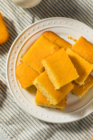 Homemade Baked American Corn Bread with Butterの写真素材