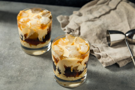 Boozy Cold Eggnog White Russian Cocktail with Coffee and Vodkaの写真素材