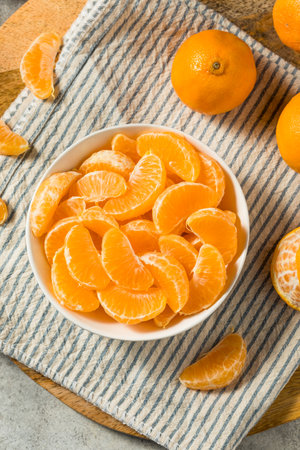 Organic Raw Peeled Mandarin Oranges Ready to Eatの写真素材