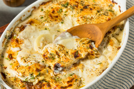 Healthy Homemade Scalloped Potatoes with Rosemary and Creamの写真素材