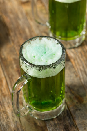 Boozy Refreshing Green St Patricks Day Beer in a Mugの写真素材