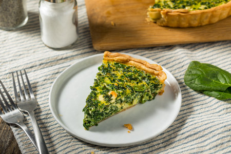 Homemade French Spinach Quiche Tart wtih Eggs and Fetaの写真素材