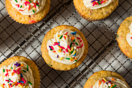 Sweet Homemade Funfetti Cupcakes with Frosting and Sprinkles