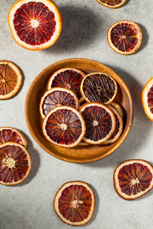 Dry Dehydrated Blood Oranges in a Bowlの写真素材