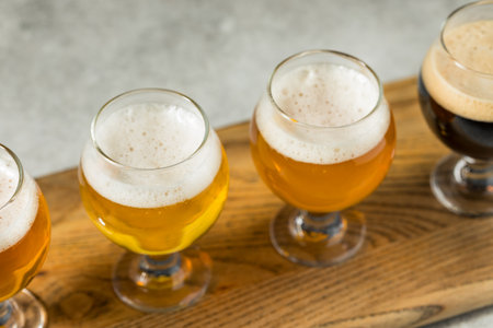 Boozy Cold Refreshing Craft Beer Flight with Peanutsの写真素材