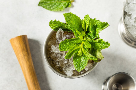 Refreshing Cold Iced Mint Julep Cocktail with Bourbon for the Derbyの写真素材