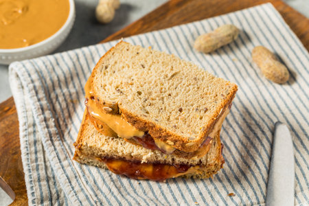 Homemade Peanut Butter and Jelly Sandwich with Whole Wheat Breadの写真素材
