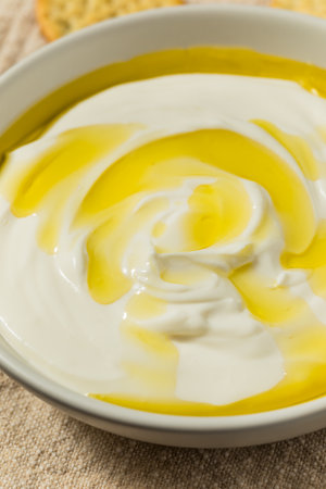 Organic Whipped Ricotta Dip Appetizer with Round Crackersの写真素材