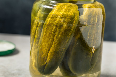 Sour Whole Dill Pickles in a Glass Jarの写真素材