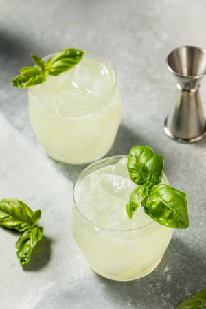 Refreshing Boozy Basil Gin Smash with Limeの写真素材