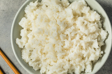 Healthy Homemade Asian White Jasmine Rice in a Bowlの写真素材