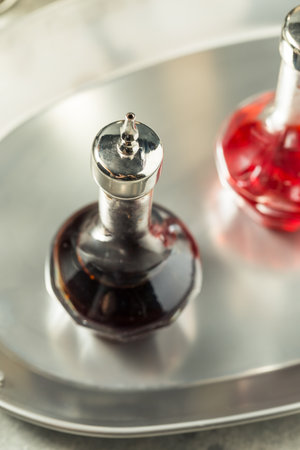 Homemade Brown Cocktail Bitters Ready to Use in a Drinkの写真素材