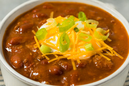Mexican Homemade Beef Chili Con Carne with Cheese and Onionsの写真素材
