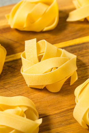 Raw Organic Italian Pappardella Fettuccine Pasta Ready to Cookの写真素材