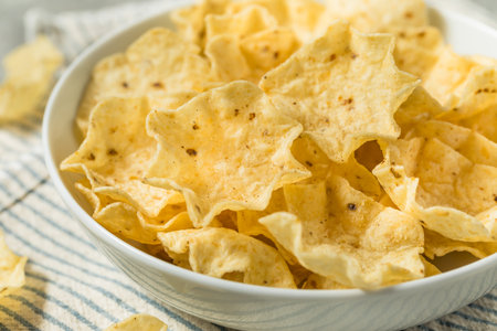 Organic Cron Tortilla Chip Scoops in a Bowlの写真素材