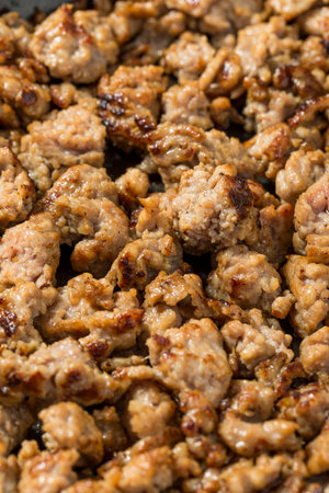 Spicy Italian Ground Sausage Meat in a Panの写真素材